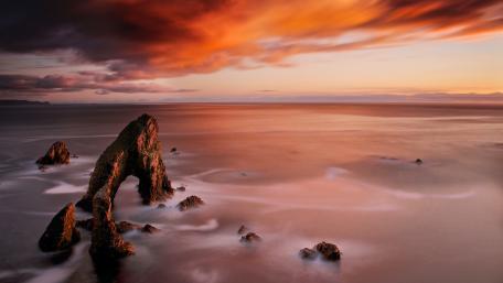 Majestic Afterglow Over Tranquil Sea wallpaper