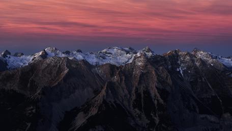 Pink Skies Over Majestic Peaks wallpaper