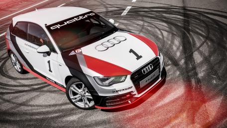 Dynamic Audi Racing Masterpiece in Action wallpaper