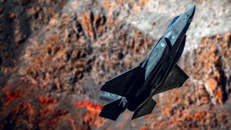 Futuristic Jet Soaring Through the Skies wallpaper