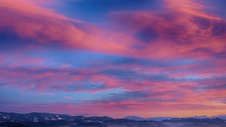 Beautiful Harmony of Crimson Sky and Mountains wallpaper