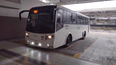 Modern City Bus in Urban Setting wallpaper
