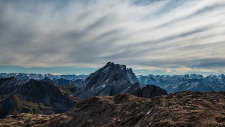 Majestic Alps Under a Dramatic Sky wallpaper