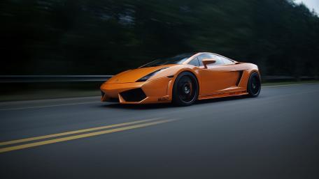 Sleek Orange Lamborghini Gallardo in Motion wallpaper