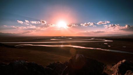 Curving River Under a Stunning Sunrise wallpaper