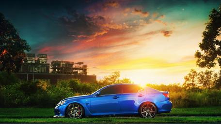 Vibrant Lexus Under a Stunning Sunset Sky wallpaper