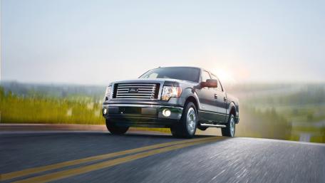 Sleek Ford Pickup Truck in Motion wallpaper