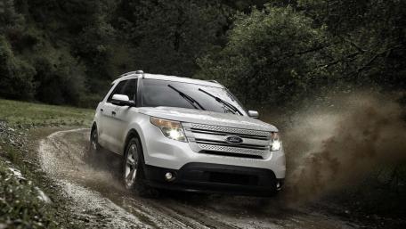 Adventurous Ford Explorer on a Muddy Trail wallpaper