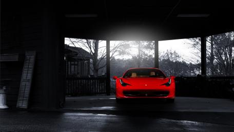 Stunning Red Ferrari 458 in a Dramatic Setting wallpaper