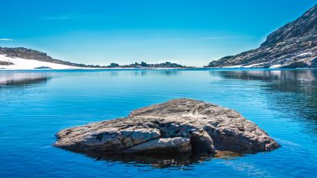 Serene Blue Lake Reflection Scene wallpaper