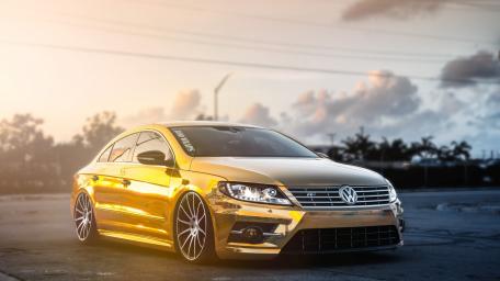 Shining Volkswagen in Stunning Gold Finish wallpaper