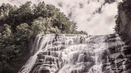 Majestic Waterfall in Monochrome Artistic Style wallpaper