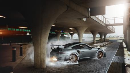 Porsche GT2 RS burning the wheels wallpaper