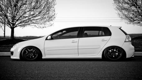 Sleek White Car in Monochrome Elegance wallpaper