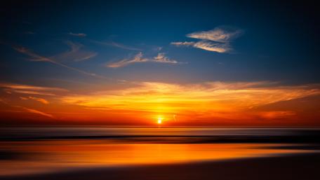 Orange sunset on the beach wallpaper