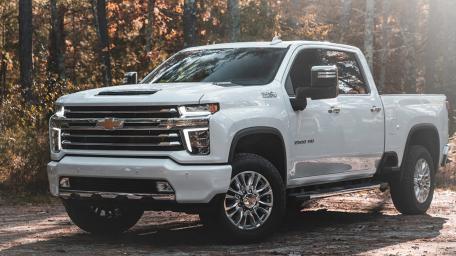Sleek Chevrolet Silverado in Nature's Embrace wallpaper