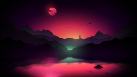 A couple in the mountains at sunset wallpaper