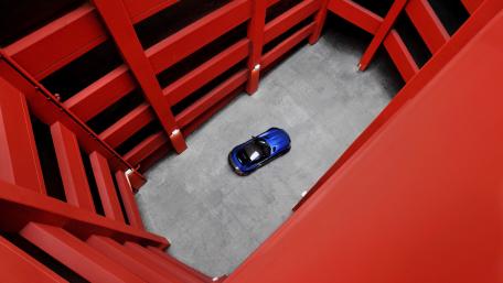 Vibrant Red Elegance of a Sports Car wallpaper