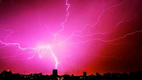 Electric Elegance: Pink Sky Lightning Storm wallpaper