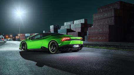 Vibrant Green Lamborghini in Urban Night Scene wallpaper