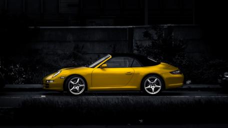 Striking Yellow Porsche Boxster Wallpaper wallpaper