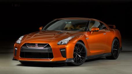 Sleek Nissan GT-R in Striking Orange Shade wallpaper