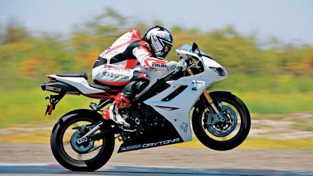 Thrilling Motorcycle Ride at High Speed wallpaper