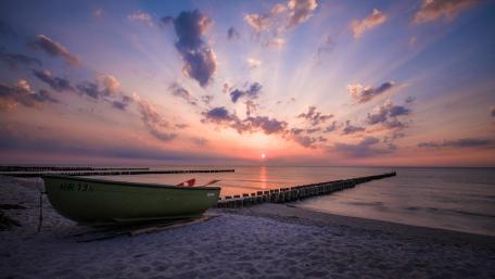 Serene Sunset by the Shore wallpaper