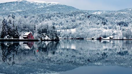 Snowy Cottage Reflection in Winter Wonderland wallpaper