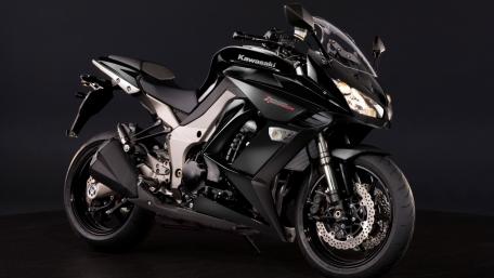 Sleek Black Kawasaki Motorcycle Wallpaper wallpaper
