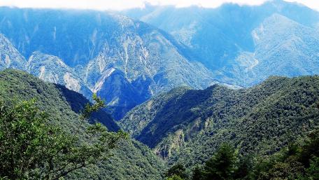 Majestic Mountain Landscape in Lush Greenery wallpaper