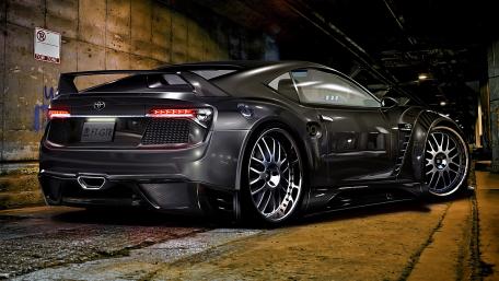 Sleek Black Toyota Sports Car Wallpaper wallpaper
