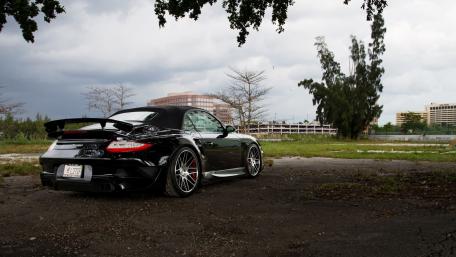 Sleek Porsche in an Urban Landscape wallpaper