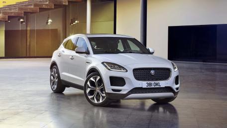 Sleek Jaguar E-PACE in Modern Setting wallpaper