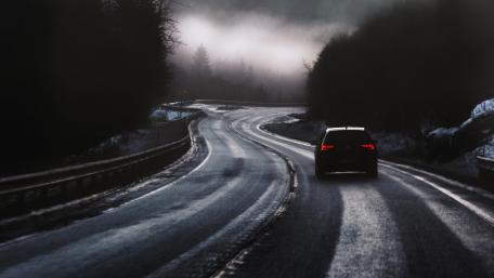 Mysterious Journey Through Winter Roads wallpaper