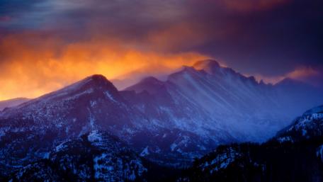 Majestic Winter Mountains Under a Colorful Sky wallpaper