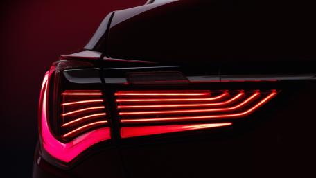 Sleek Illumination of Acura RLX Sport Hybrid Tail Light wallpaper