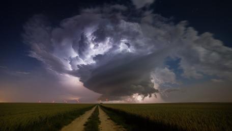Majestic Storm Over Open Plains wallpaper