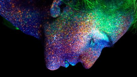Vibrant Glow of Body Art Displayed on Portrait wallpaper