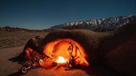 Bonfire Under the Stars in the Mountains wallpaper