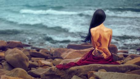 Contemplative Solitude by the Sea wallpaper