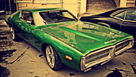 Green Classic Beauty on Display in Urban Setting wallpaper