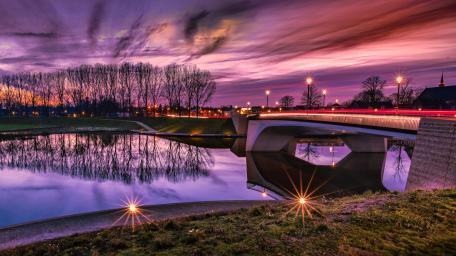 Bridge at Sunset Mirroring Nature's Beauty wallpaper