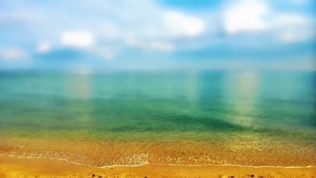 Tranquil Blur of Shoreline Waters wallpaper