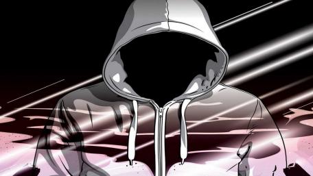 Mysterious Hooded Figure in Ethereal Light wallpaper