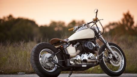 Sleek Motorcycle against Twilight Sky wallpaper