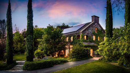 Tranquil Stone Cottage at Dusk wallpaper