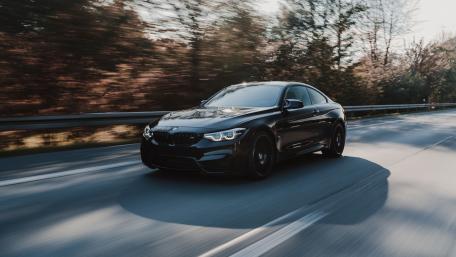 BMW M4 in Motion: Elegance Meets Power wallpaper