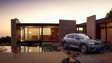 Sleek Volkswagen Atlas Cross Sport in Modern Setting wallpaper