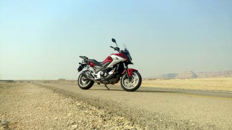 Sleek Honda Motorcycle on an Open Desert Road wallpaper